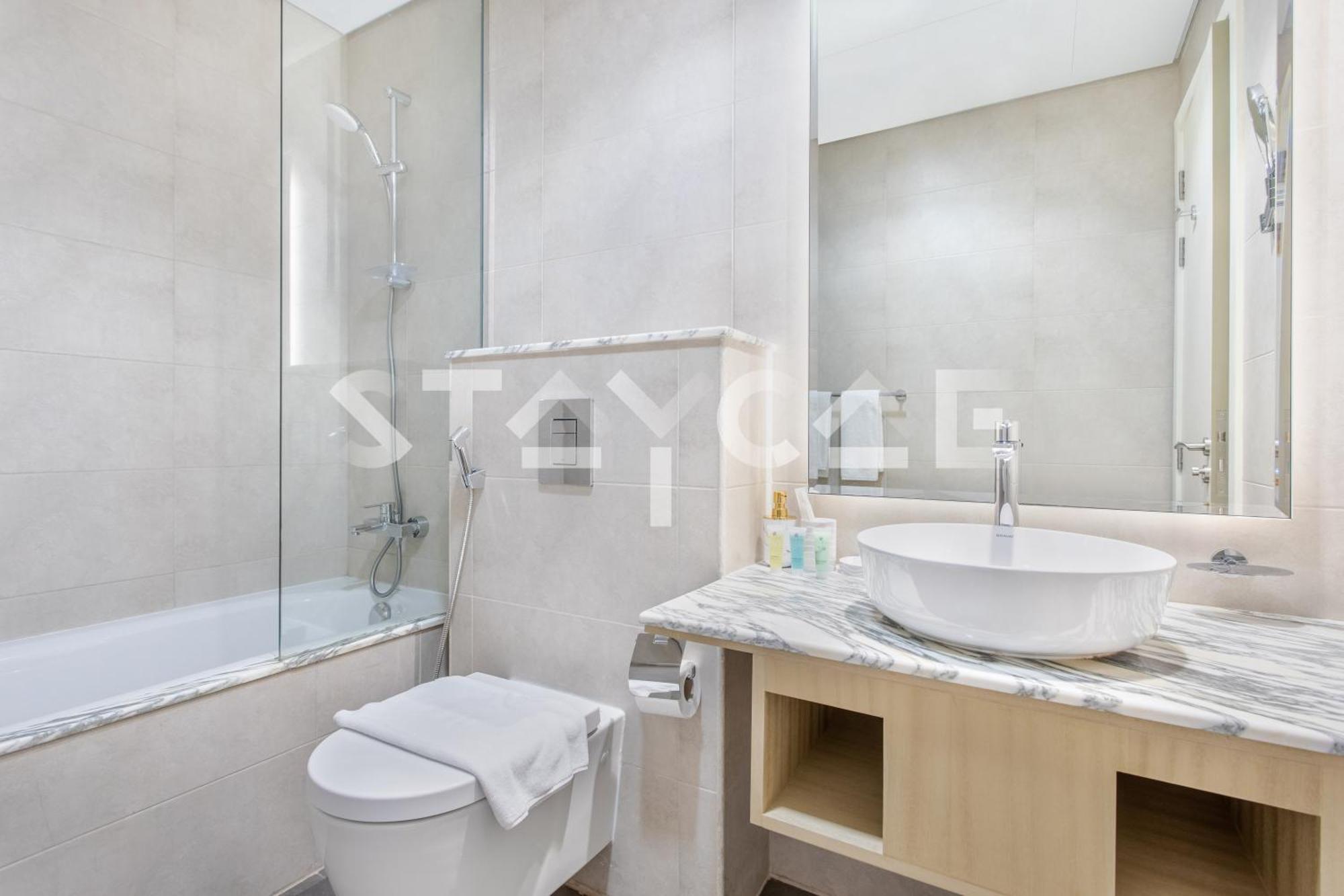 شقة Staycae Homes - Paramount Midtown *